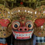 Close-up of a colorful and ornate Barong mask showcasing Balinese artistry and mythology.
